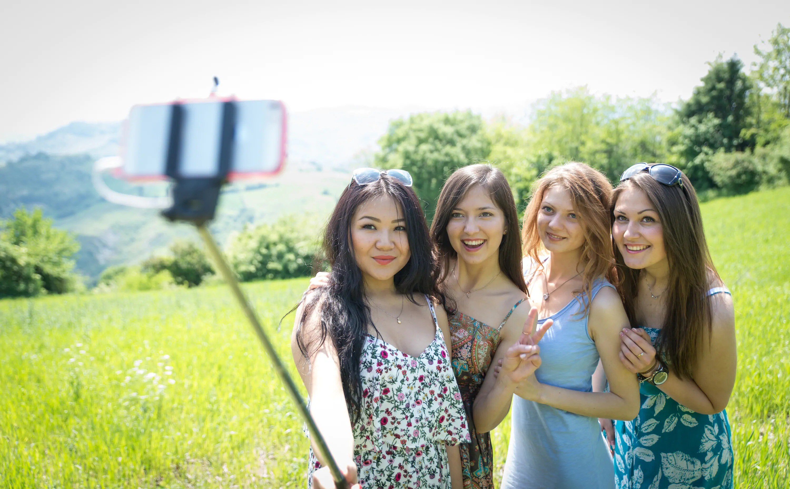 girls smiling outside