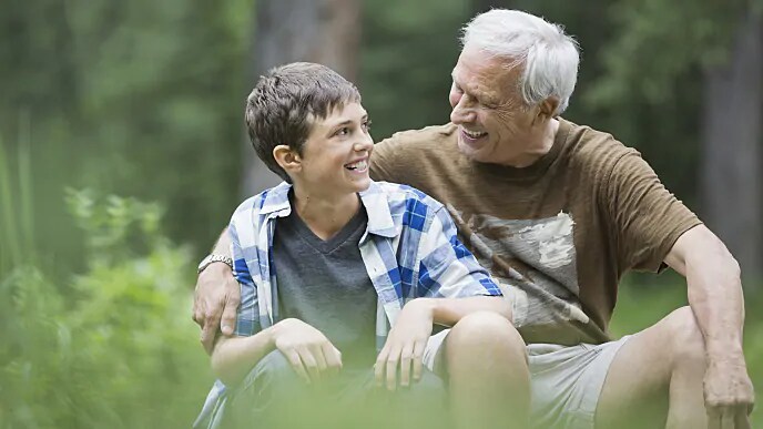 father and son laughing together