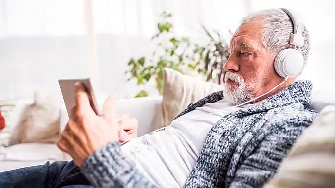 Man looking at a tablet