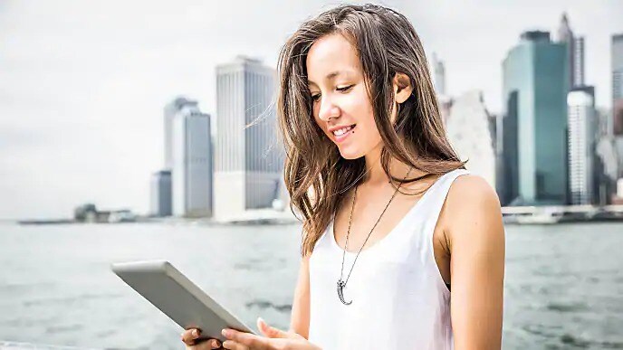 woman reading about enamel pearls