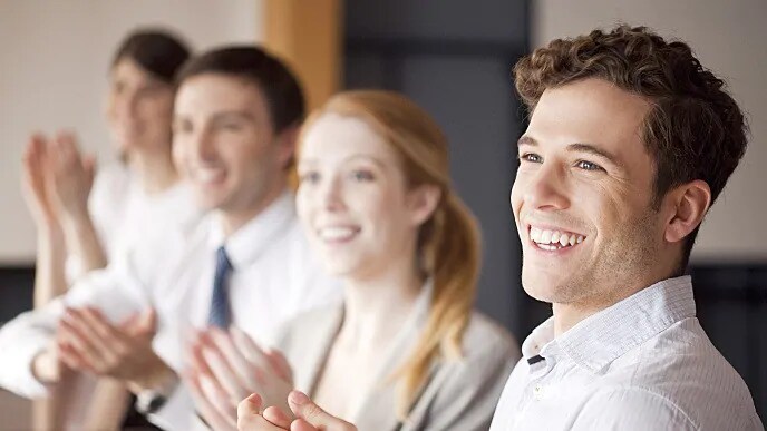 people smiling at dental conference
