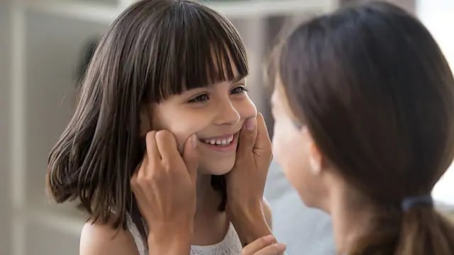 kid smiling after cheek swelling subsiding