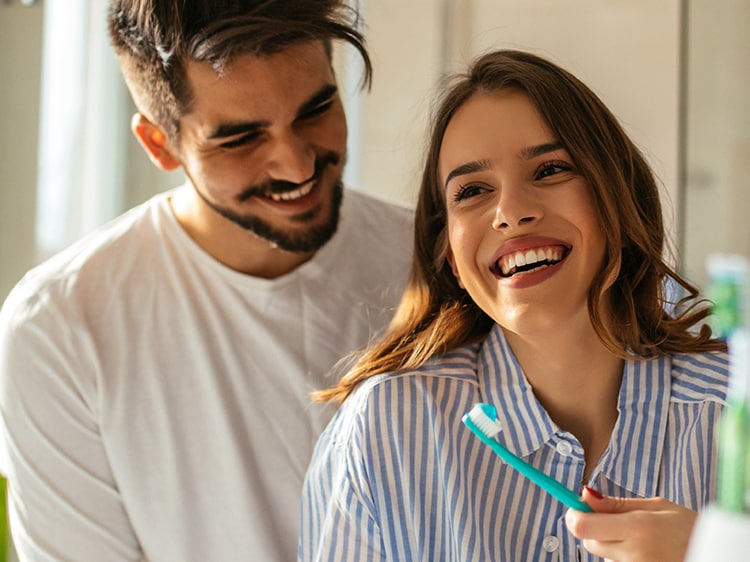 couple practicing good oral health