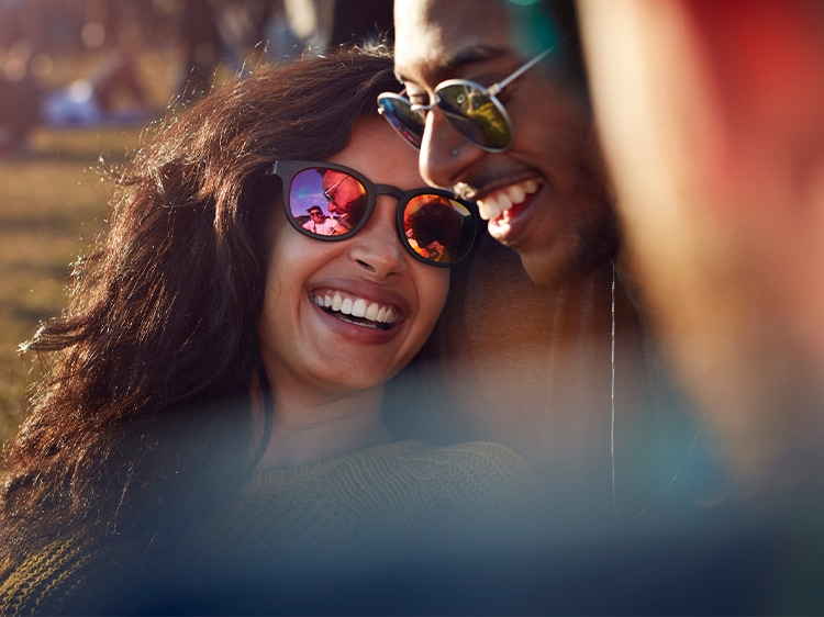 smiling couple at a park