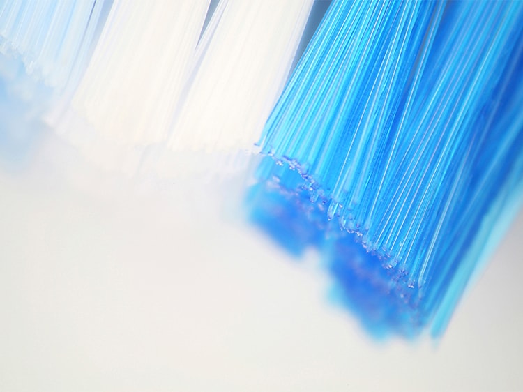 extreme close up of colgate toothbrush bristles