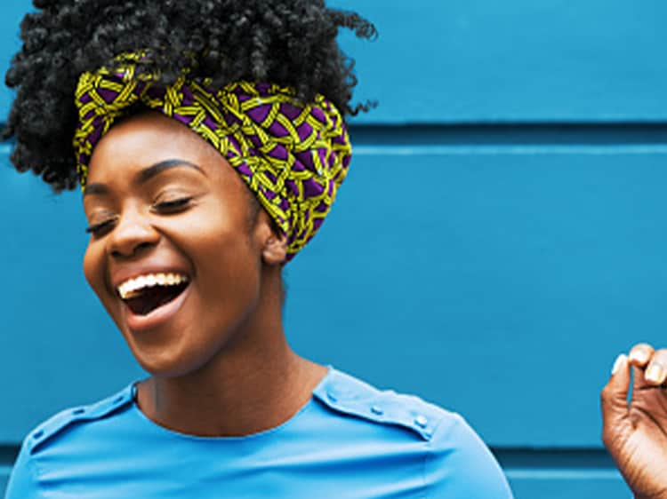 woman smiling showing white teeth