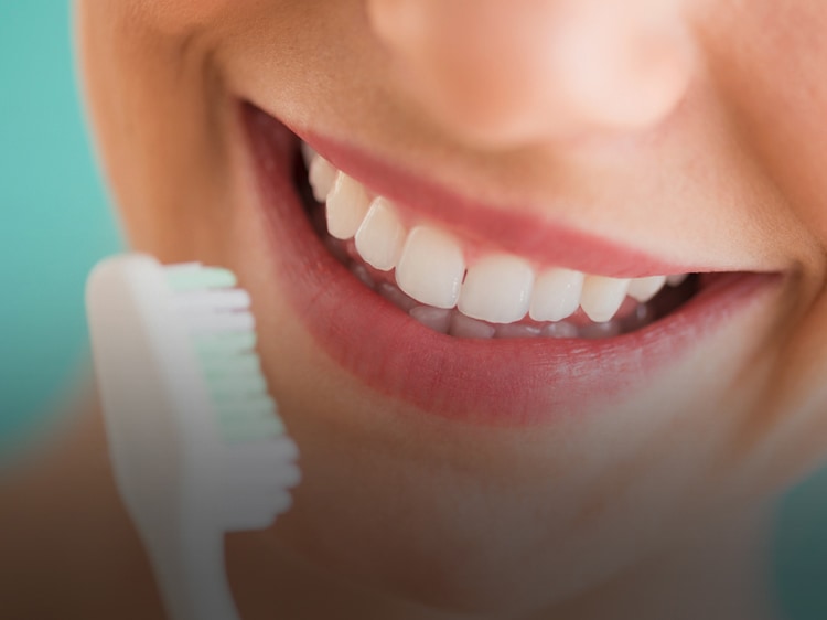 extreme close up of colgate toothbrush bristles