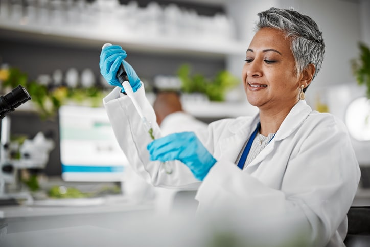 sciencist woman testing