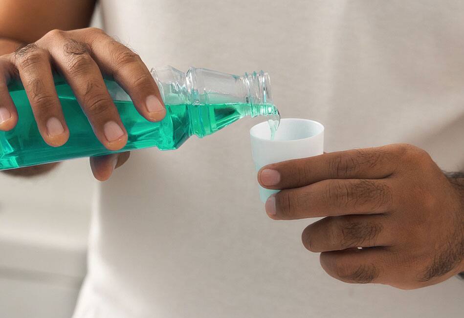 Hands with mouthwash
