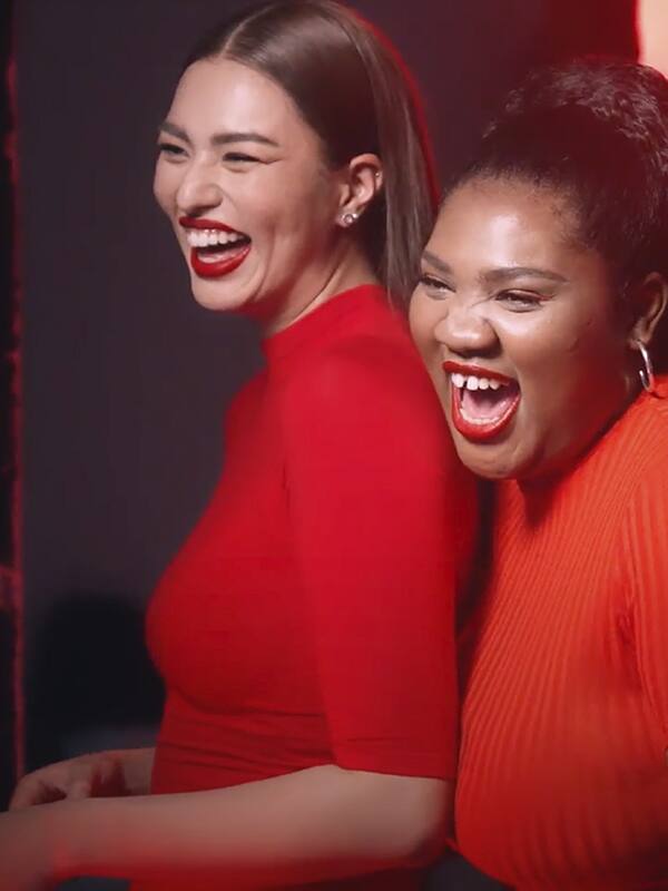 Ann and Suzie smiling confidently and loudly Ann and Suzie smiling confidently and loudly