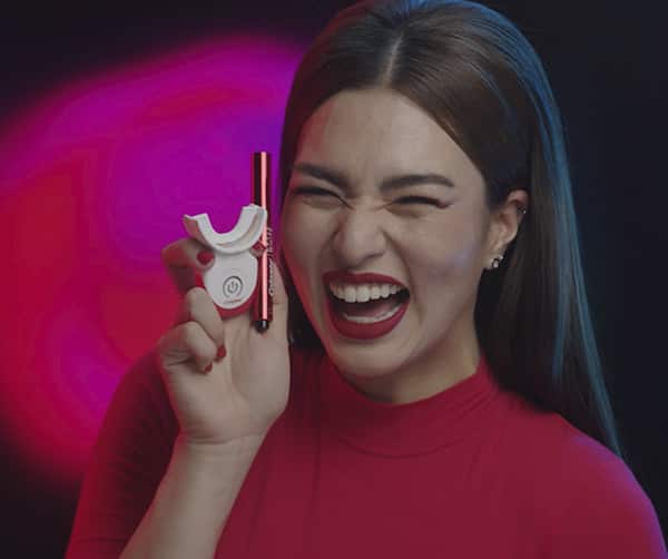 Ann smiling out loud with Colgate's Teeth Whitening Kit with Indigo Light