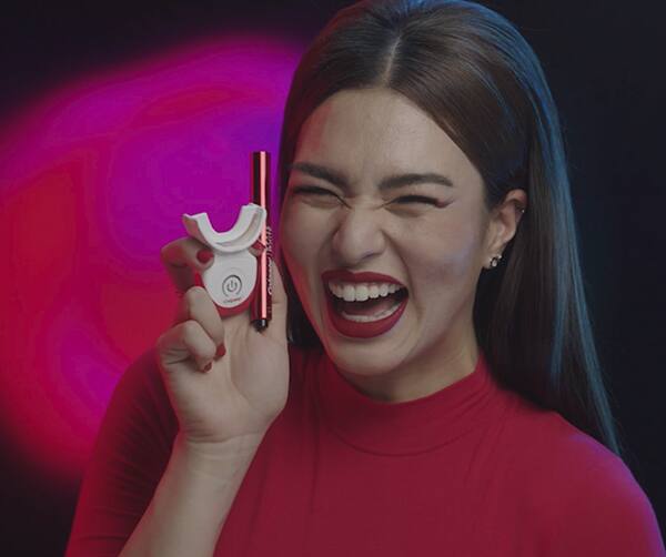 Ann smiling out loud with Colgate's Teeth Whitening Kit with Indigo Light Ann smiling out loud with Colgate's Teeth Whitening Kit with Indigo Light