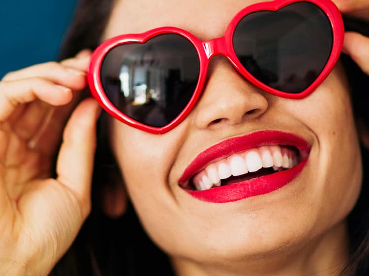 Lady with heart shaped sunglasses
