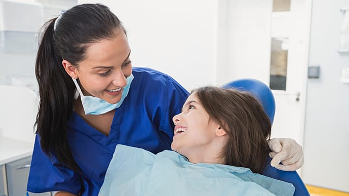pediatric dentist with a child