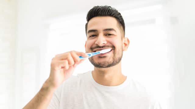Young Boy Brushing Teeth 