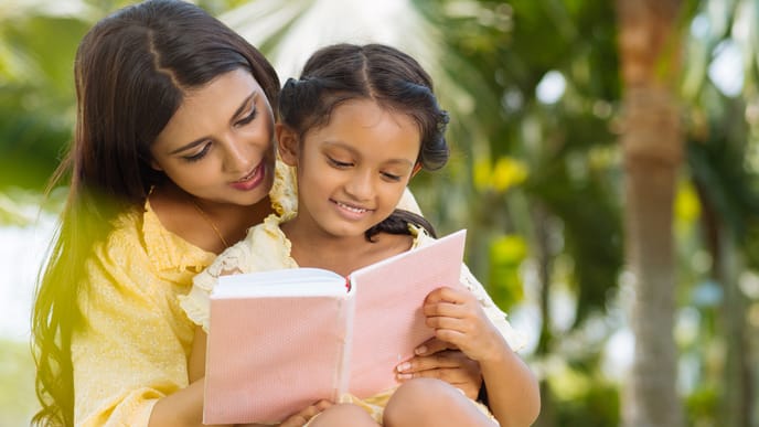 Mother and daughter reading
