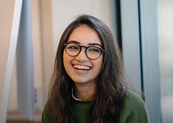 young girl with glasses