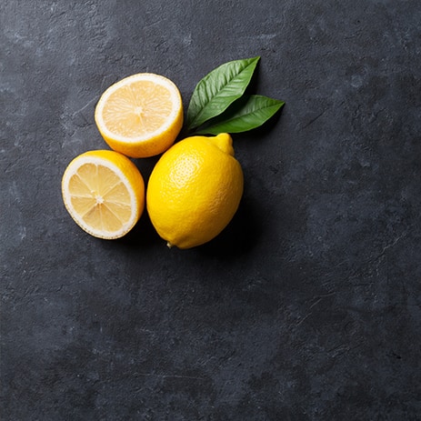 fresh-ripe-lemons-on-dark