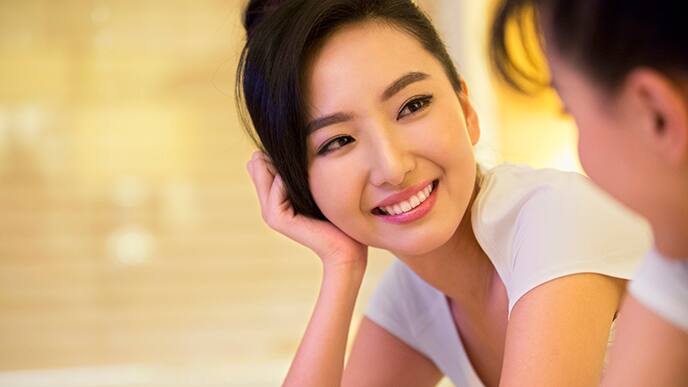 woman showing polished white teeth