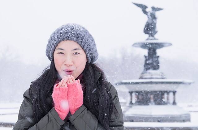 Asian woman outdoors during winter