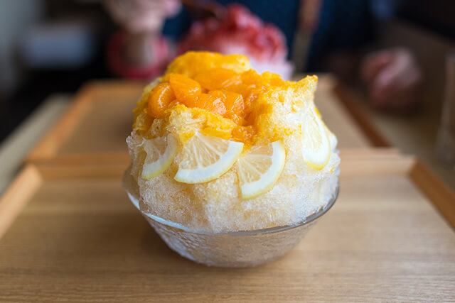 shaved ice with orange toppings