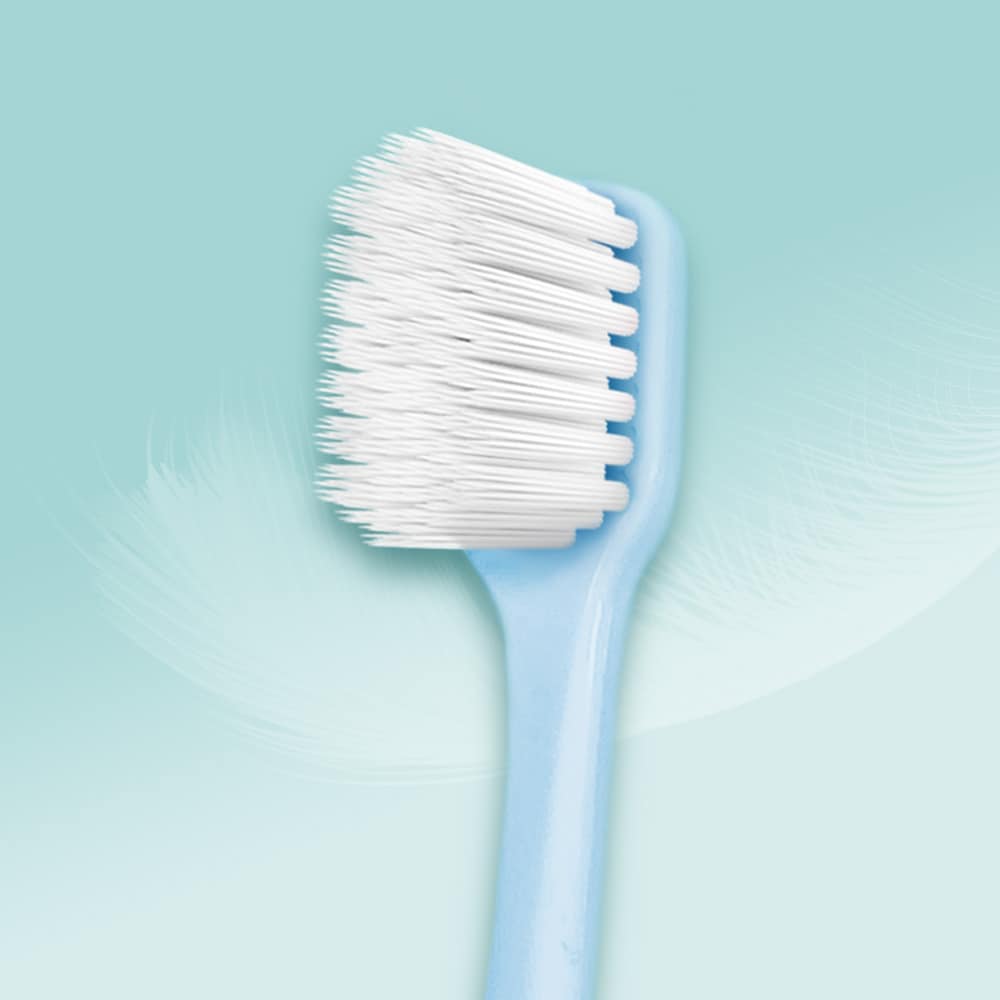 Close-up of Colgate Gentle Clean Toothbrush’s wide head