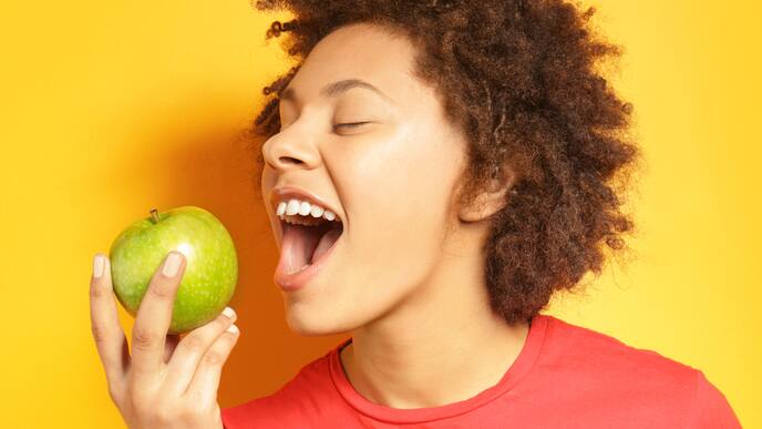 Girl eating apple