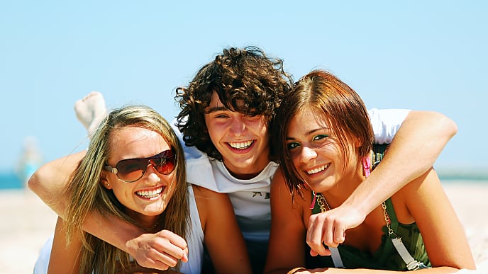 Friends hanging out at the beach 