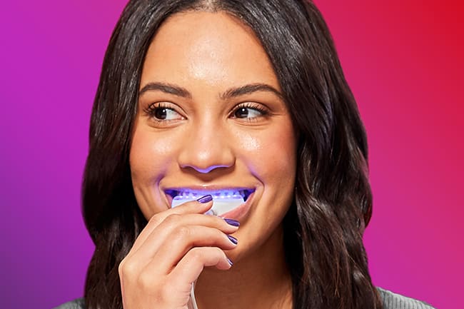 Woman using LED device