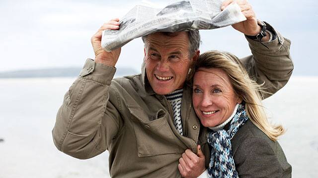 Elderly couple embraced outside Elderly couple embraced outside
