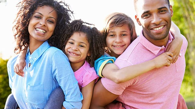 Parents with two children outdoors