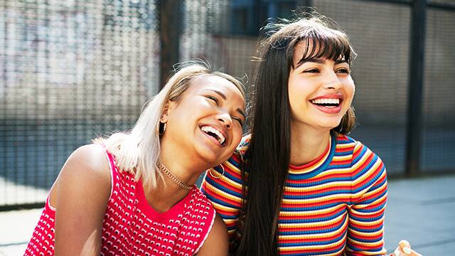 2 girls laughing 