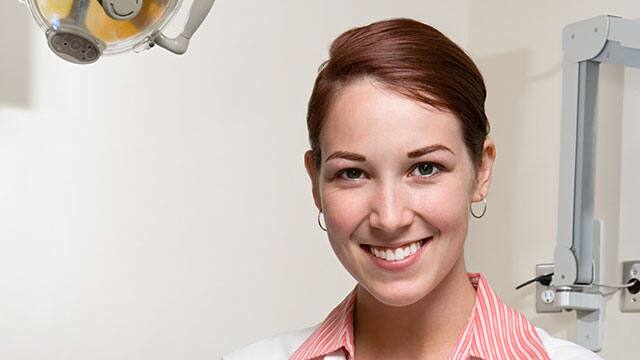 A female dentist in her office