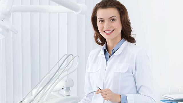A female dentist in her office A female dentist in her office
