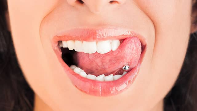 A Gum Piercing: What You Need To Know | Colgate®