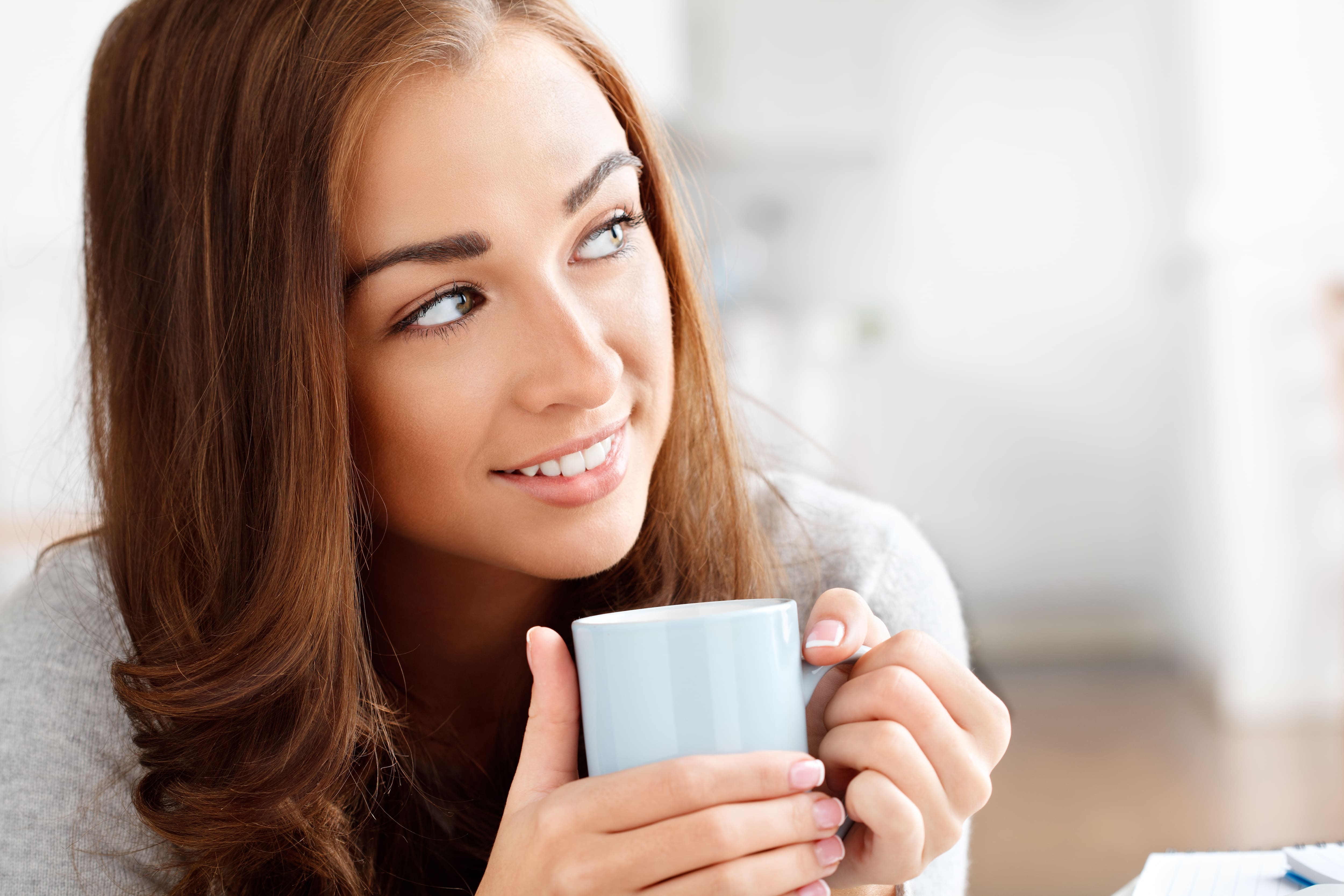 young women drinking coffee