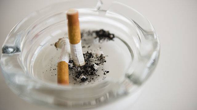 Two cigarettes in an ashtray