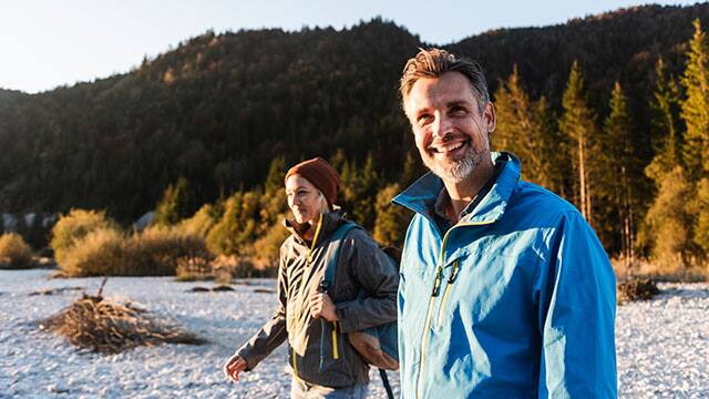 A couple hiking outdoors