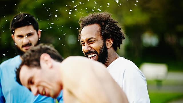 Three men having fun outdoors