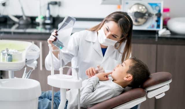 Kid at dentist