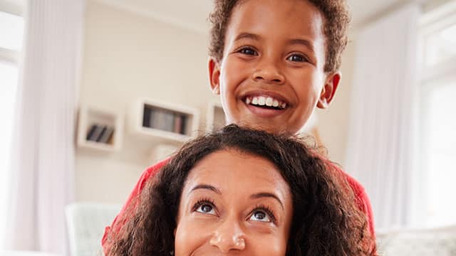 Mom and smiling kid