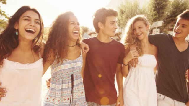 Friends laughing and enjoying outdoors