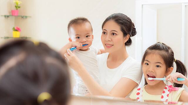 happiness family daily life photo of young mother with kid looking at mirror