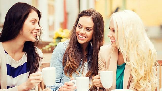 Three smiling women