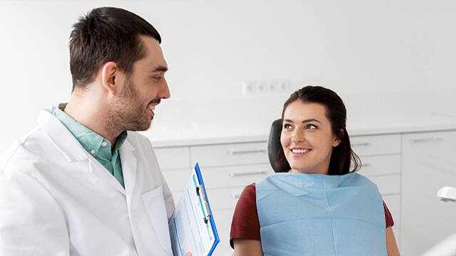 Dentist and patient in a dental office