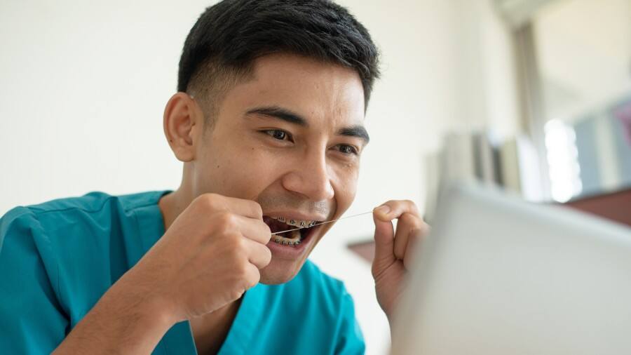 cleaning between teeth with a floss threader - colgate philippines cleaning between teeth with a floss threader - colgate philippines