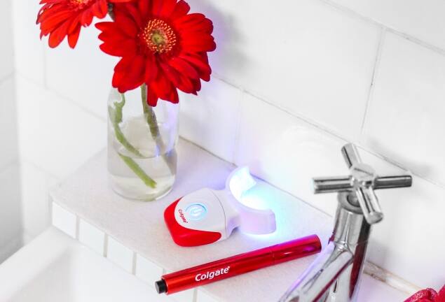 Colgate LED and Pen Teeth Whitening Products on the bathroom sink