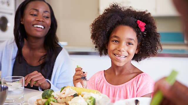 Families eating together at home