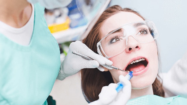 Woman patient dental braces dentist chai