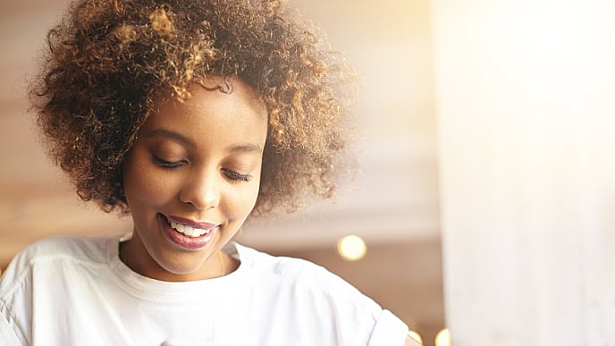 A woman smiling